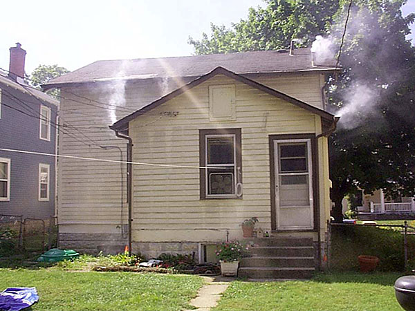 Illegal downspout hookup revealed by Superior Smoke Illegal downspout hookup revealed by Superior Smoke